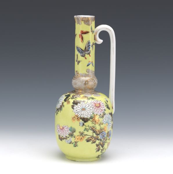 Appraisal: JAPANESE PORCELAIN ENAMELED EWER WITH CITRON COLOR GLAZING With long