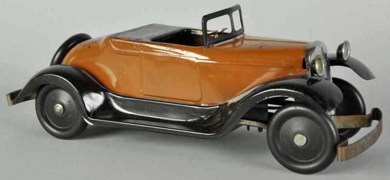 Appraisal: Pressed Steel Convertible Automobile Wind-Up Toy Description American Working All