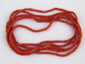 Appraisal: A coral bead necklace beads approx mm diameter cm long