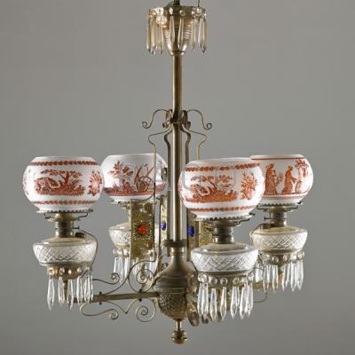 Appraisal: AESTHETIC MOVEMENT Brass and jeweled four-arm chandelier with electrified oil