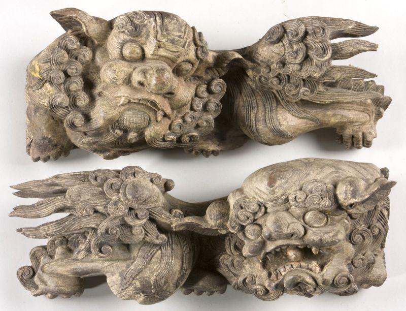 Appraisal: Pair of Antique Carved Wooden Foo Dogs Chinese each carved