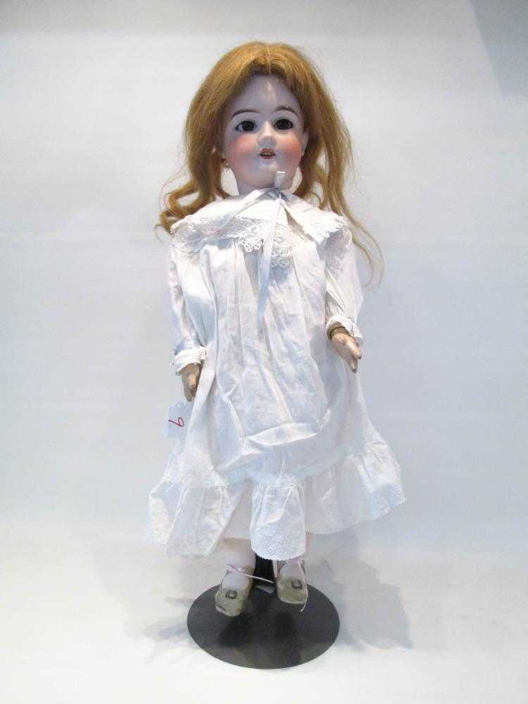 Appraisal: ARMAND MARSEILLE BISQUE SOCKET HEAD CHILD DOLL Floradora with blond