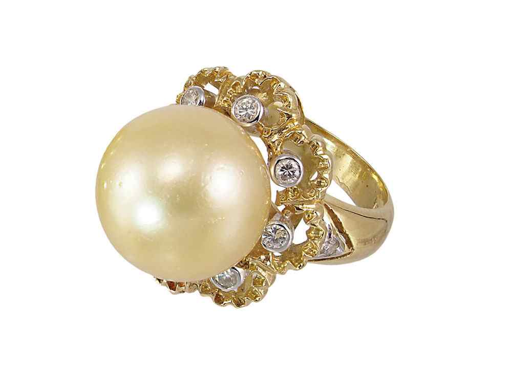 Appraisal: K SOUTH SEA GOLDEN PEARL AND DIAMOND RING K yellow