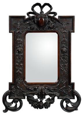 Appraisal: Chippendale style carved mirror mahogany with elaborately carved ribbon garland