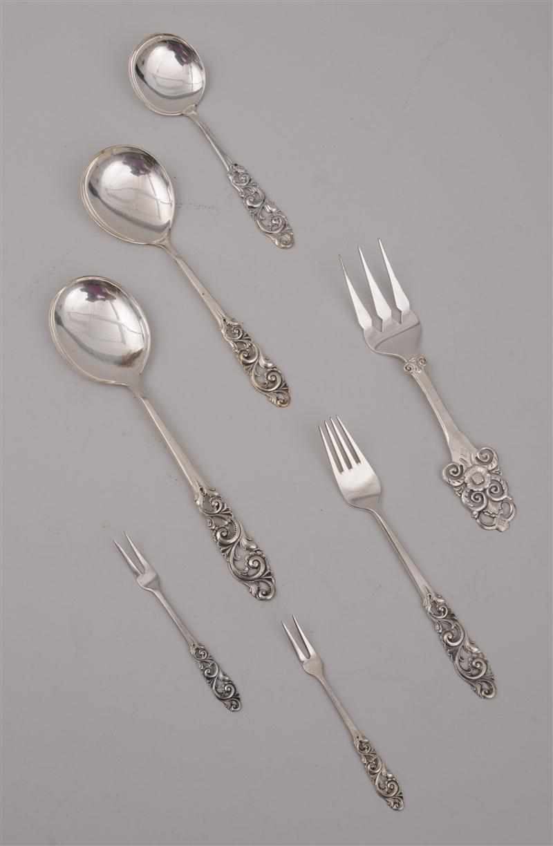 Appraisal: NORWEGIAN SILVER FLATWARE ARTICLES WITH PIERCED HANDLES Stamped including twenty-three