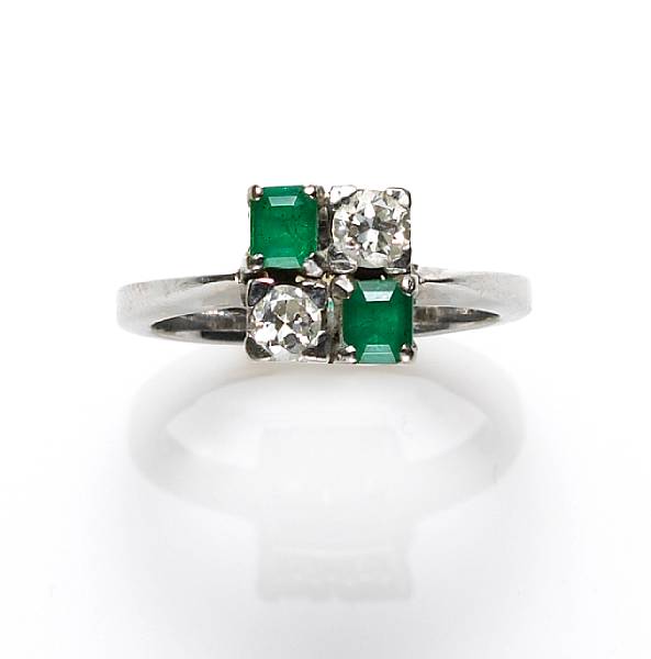 Appraisal: A diamond emerald and k white gold ring