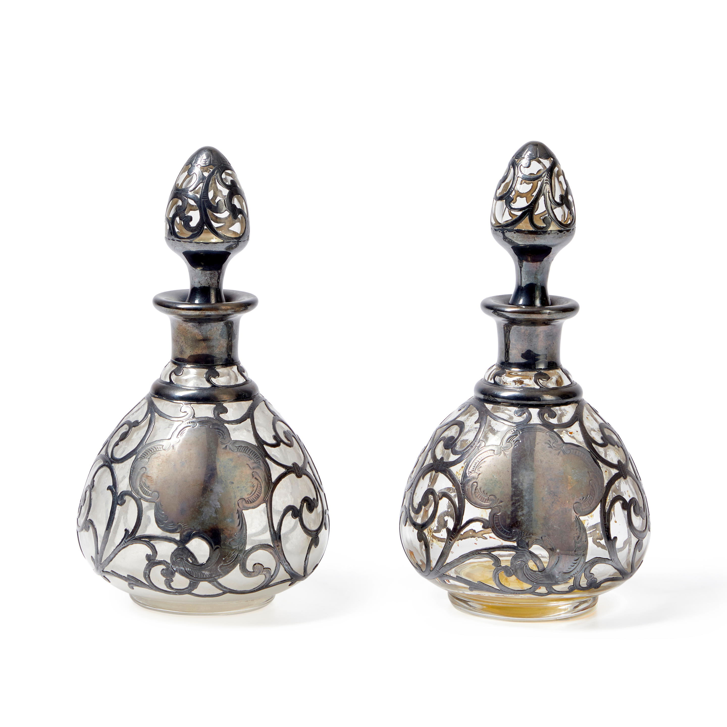 Appraisal: Two Silver-overlay Glass Perfume Bottles one with a broken top