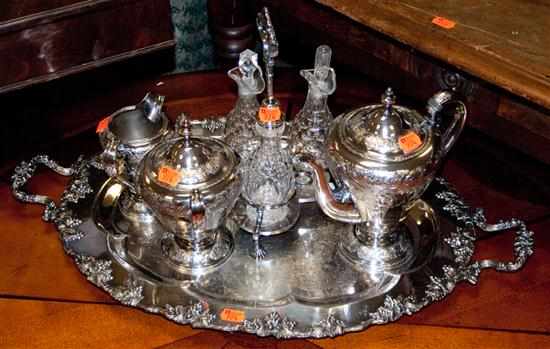 Appraisal: Silver-plated tea set and a cruet set Estimate - No