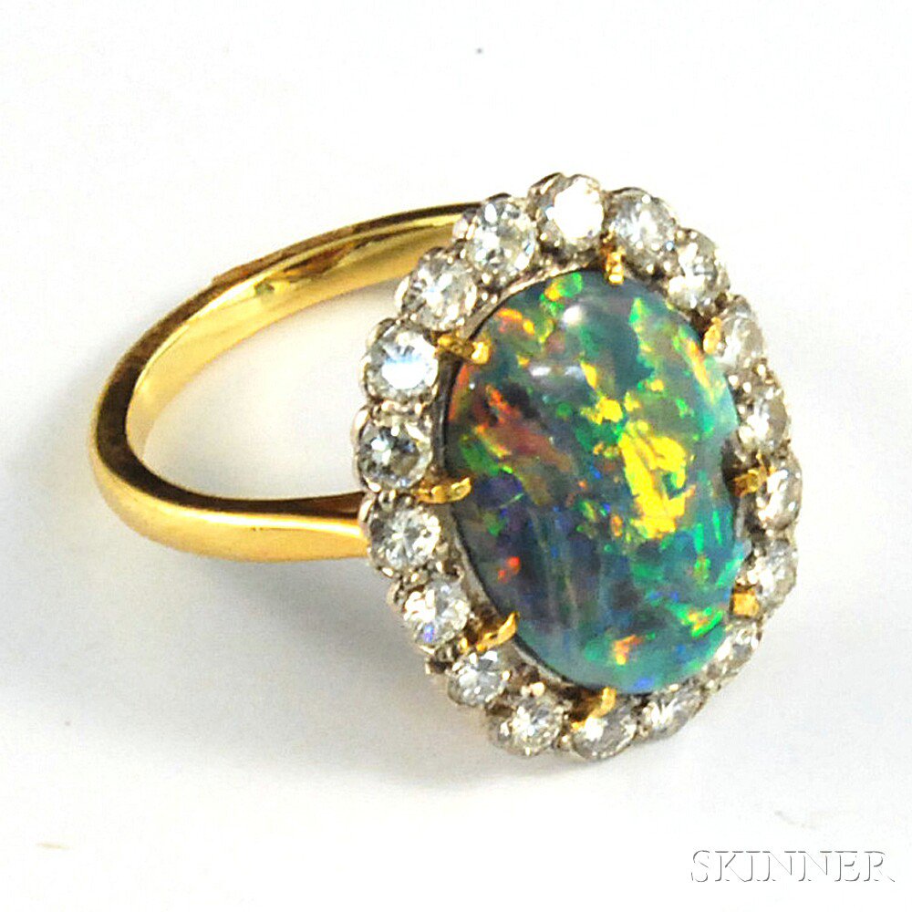 Appraisal: kt Gold Black Opal and Diamond Ring centered with an