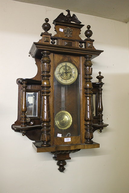 Appraisal: A LATE TH CENTURY WALNUT WALL CLOCK in the Vienna