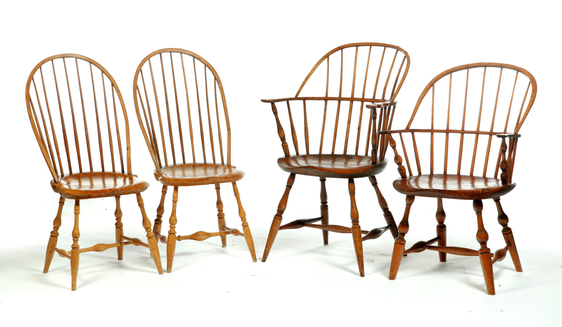 Appraisal: FOUR WINDSOR CHAIRS American st quarter- th century Two sackback