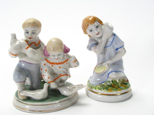 Appraisal: Two Vintage Russian Porcelain Figures Pollonye Russian porcelain fabrique both