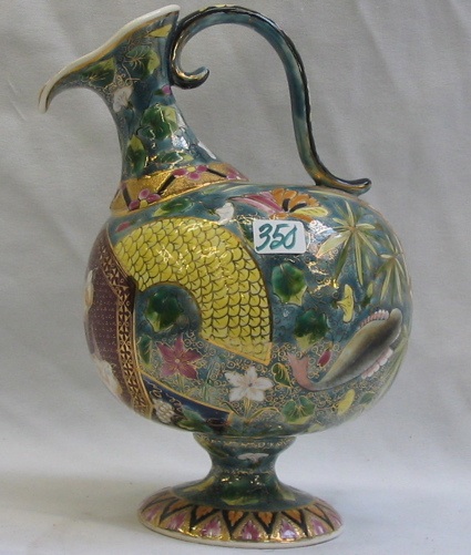 Appraisal: AN ITALIAN PORCELAIN WINE JUG hand enameled flower and bird