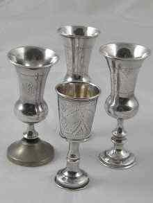 Appraisal: Four hallmarked English silver kiddush cups one with replacement silver