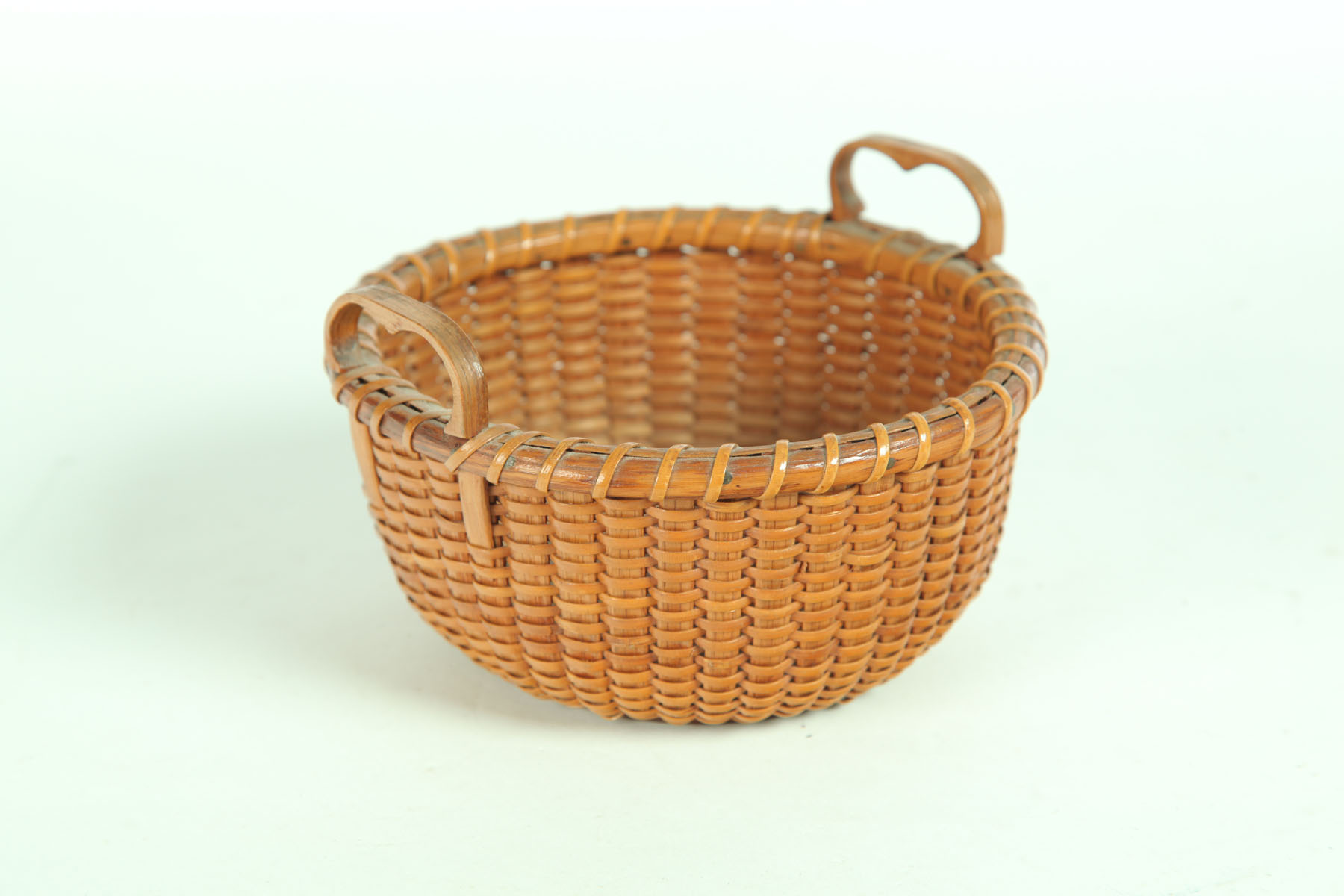 Appraisal: NANTUCKET BASKET American th century Signed '' Made by AD