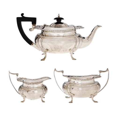 Appraisal: A George V silver tea service teapot cm h by