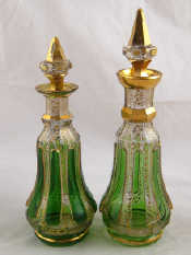 Appraisal: A pair of Bohemian glass condiment bottles with green flashed