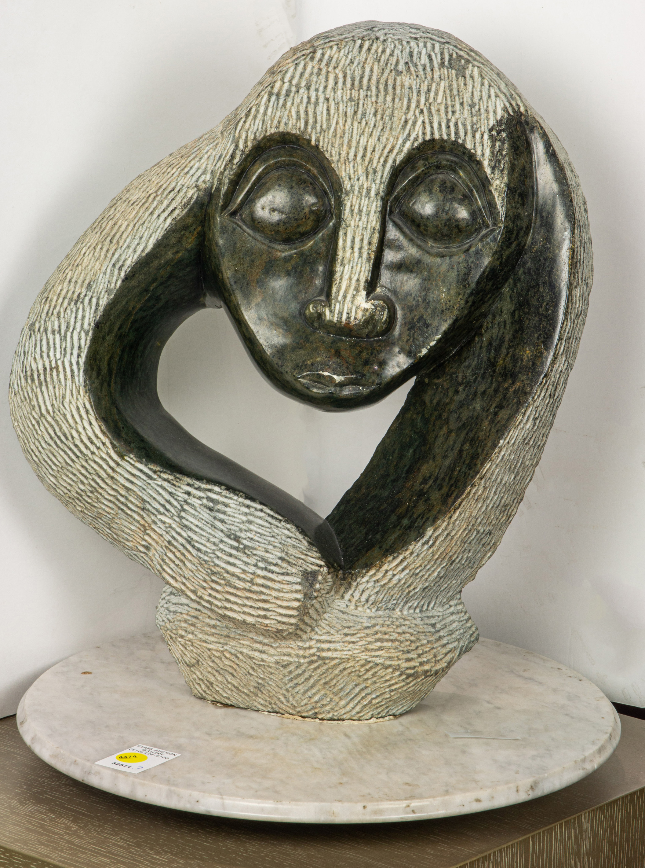 Appraisal: A ZIMBABWEAN SHONA SCULPTURE BY SHAIBU KANYEMBA A Zimbabwean Shona