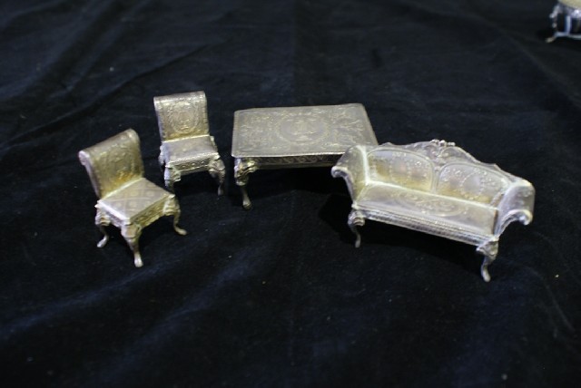 Appraisal: A set of miniature silver dolls house furniture each marked