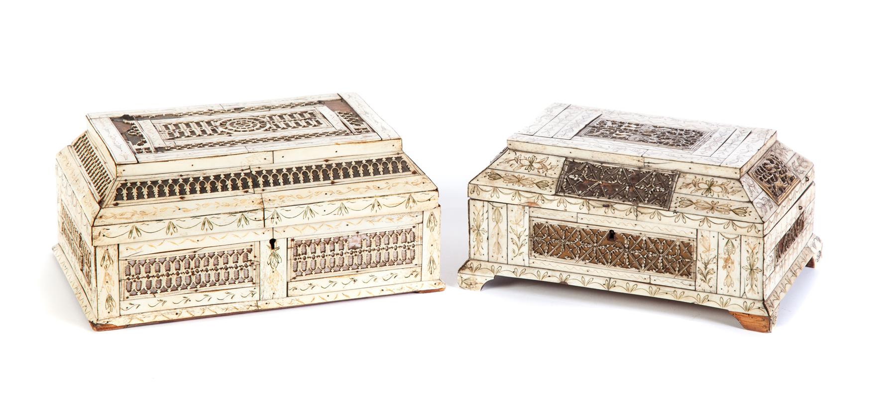 Appraisal: TWO CARVED EUROPEAN COFFERS Nineteenth century Pine boxes with chamfered