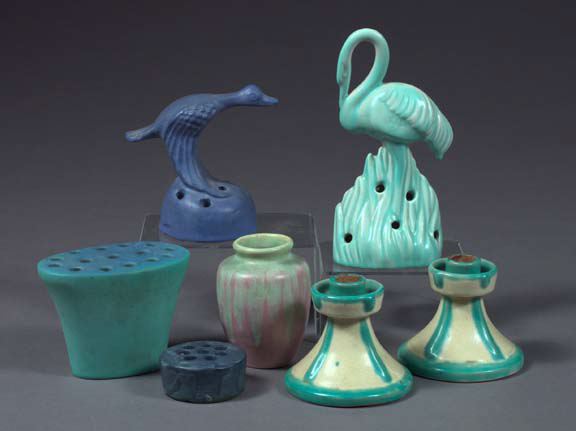 Appraisal: Seven-Piece Collection of Art Pottery consisting of four flower frogs