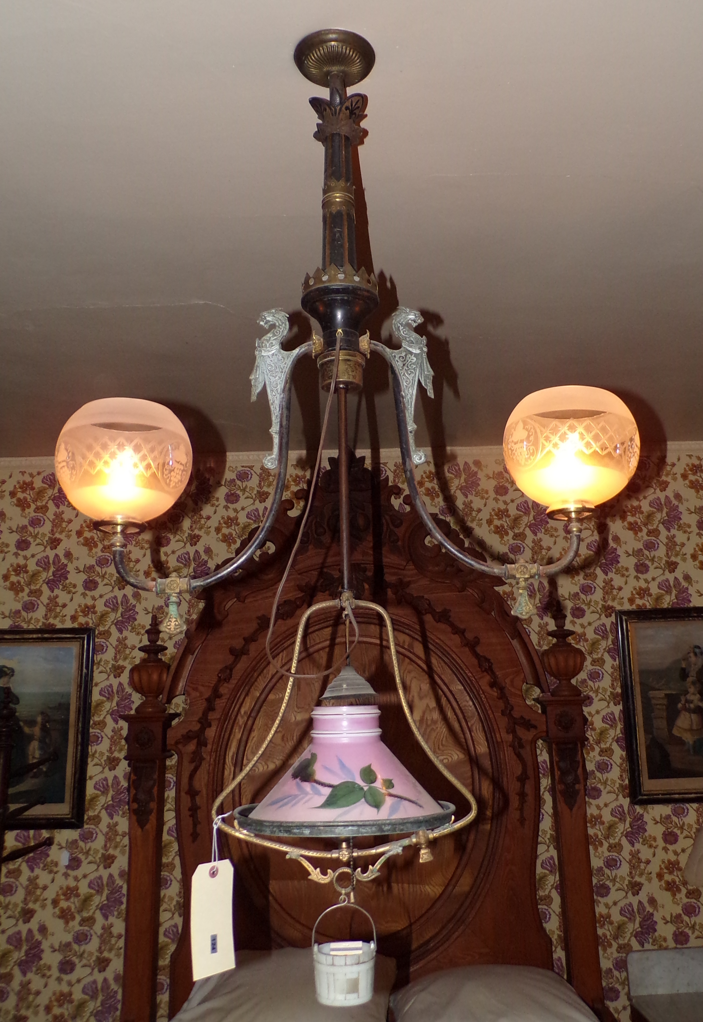 Appraisal: Hanging chandelier with arms with frosted shades above a bell