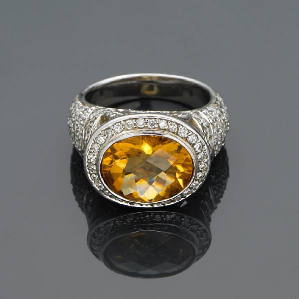 Appraisal: A diamond and citrine ring estimated total diamond weight carats