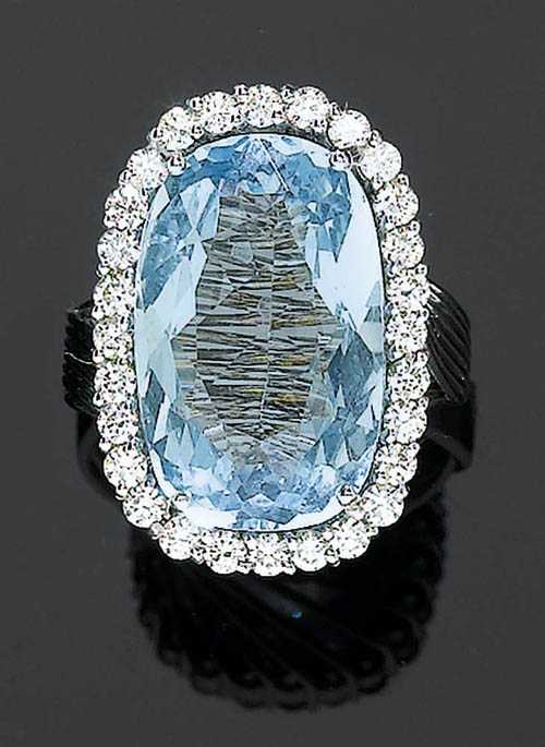 Appraisal: AQUAMARINE AND BRILLIANT-CUT DIAMOND RING White gold Fancy ring the