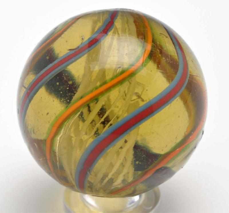 Appraisal: Rare Olive Glass White Latticino Marble Description Extremely hard-to-find olive