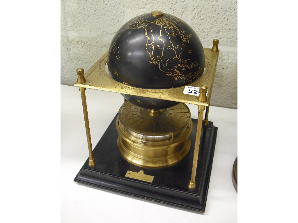 Appraisal: The Royal Geographical Society World Clock' the black and gilded