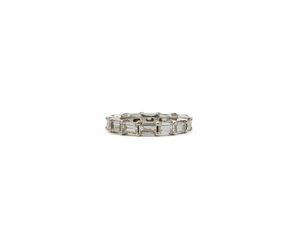 Appraisal: Platinum and Diamond Band bar-set with baguette-cut diamonds approx tcw