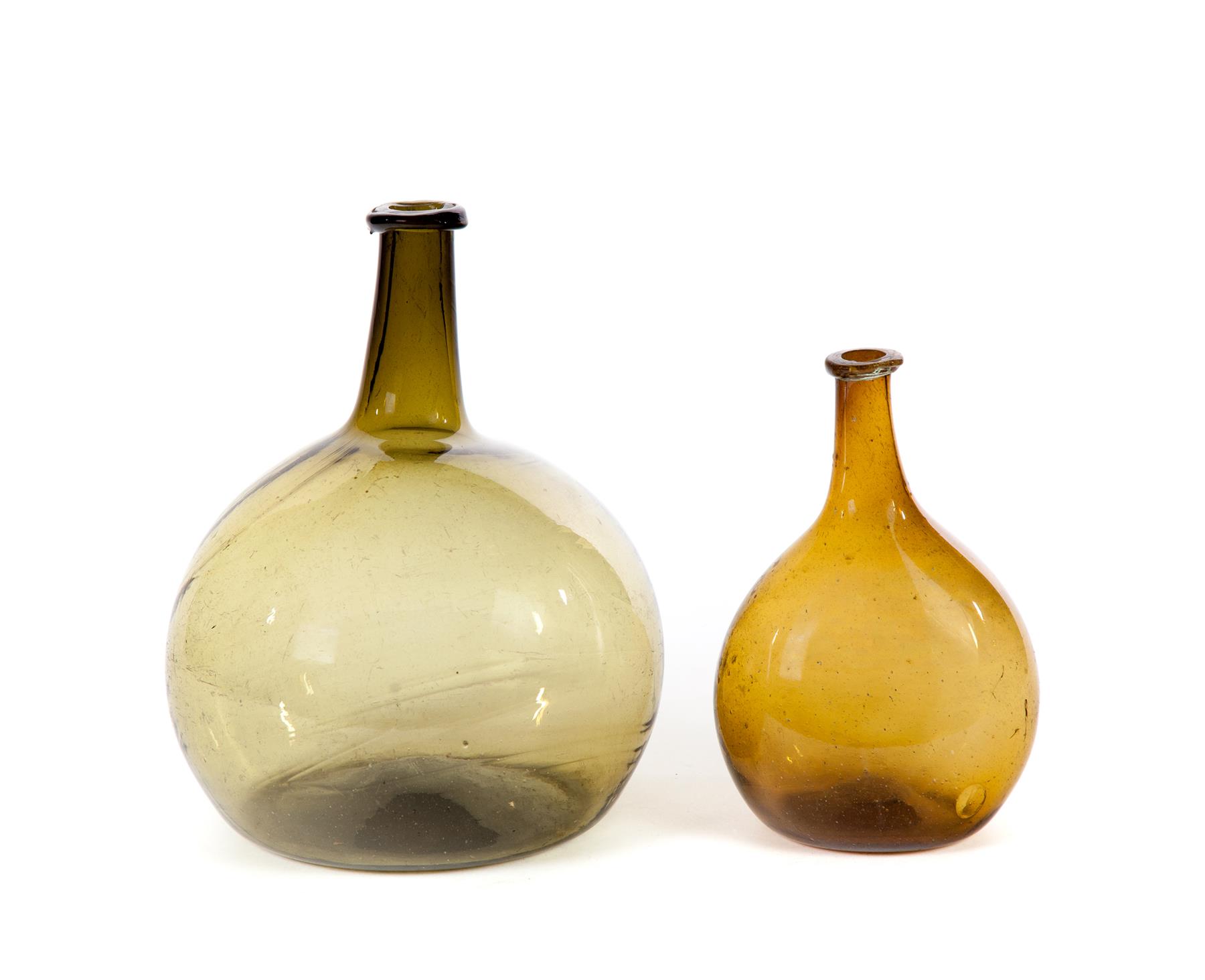 Appraisal: TWO AMERICAN BLOWN GLASS BOTTLES First half- th century Globs