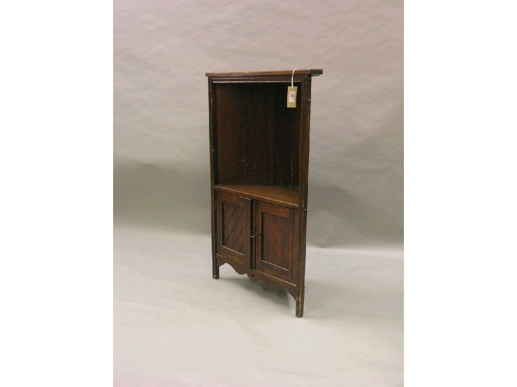 Appraisal: A late Victorian walnut corner cabinet open recess above a