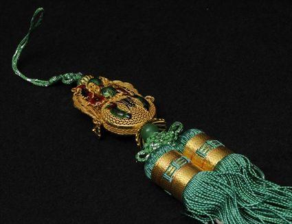 Appraisal: Green Tasseled Pendant in