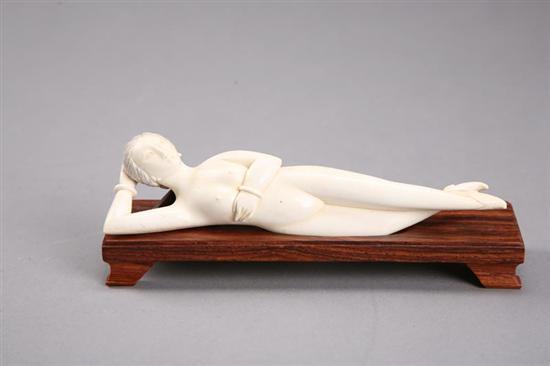 Appraisal: DOCTOR''S LADY Carved ivory figure of a reclining woman l