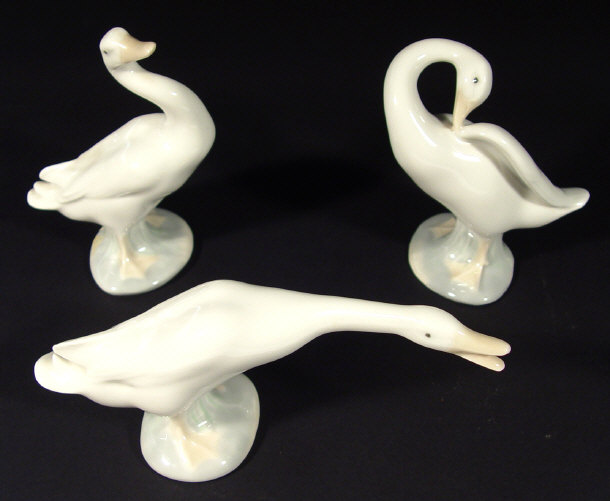 Appraisal: Three Lladro porcelain geese all with hand painted decoration and