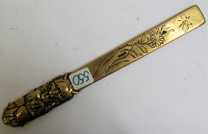 Appraisal: ASIAN BRASS PAGE TURNER having an engraved floral design on