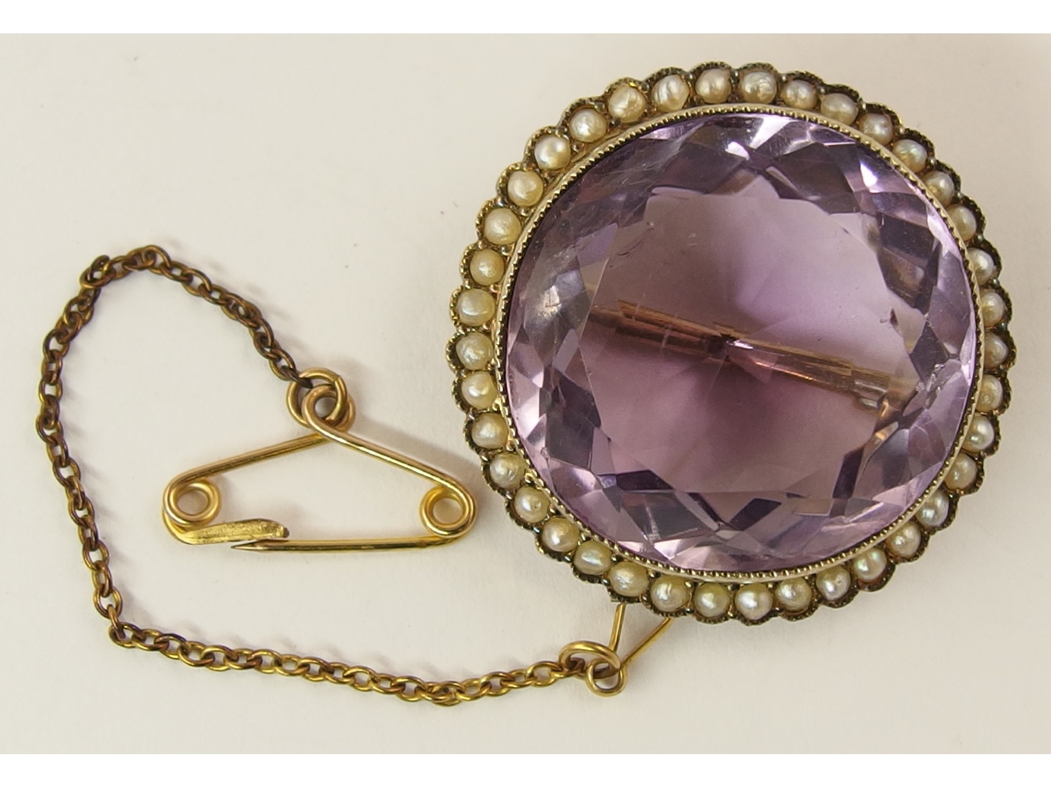 Appraisal: A ct amethyst and seed pearl brooch