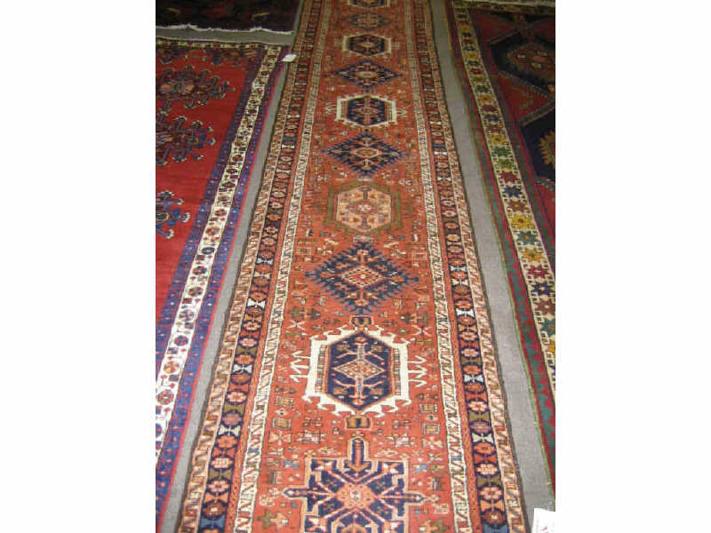 Appraisal: KARAJA RUNNER The salmon field of bold angular geometric motifs