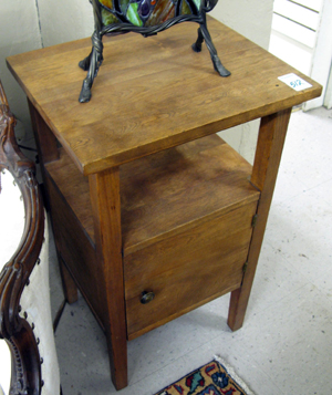 Appraisal: WALNUT NIGHTSTAND American c 's having a rectangular top raised