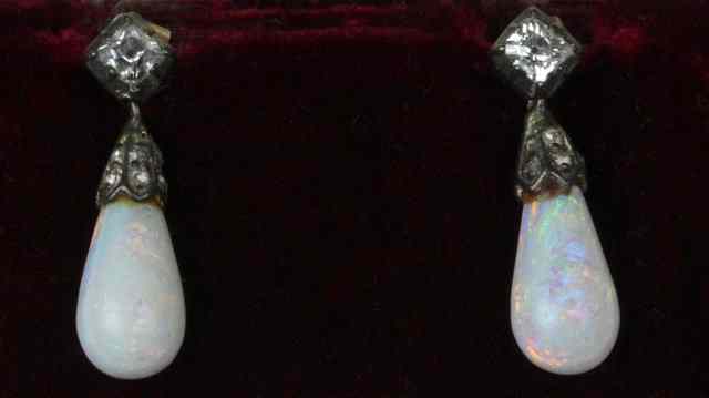 Appraisal: A pair of opal drop earrings of pear shape