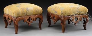 Appraisal: PAIR OF GOTHIC REVIVAL CARVED WALNUT FOOTSTOOLS American rd quarter