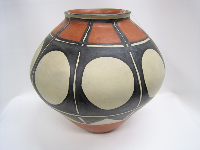 Appraisal: SANTO DOMINGO POTTERY OLLA signed underfoot by the artists potters