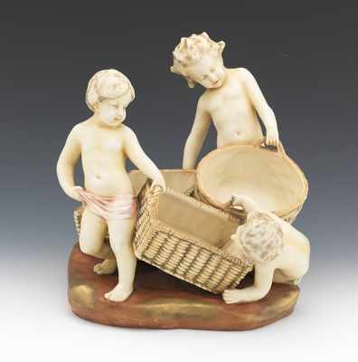 Appraisal: An Amphora Cherub Centerpiece Ceramic centerpiece design with three figural