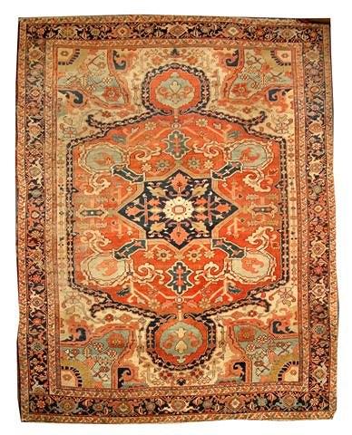 Appraisal: AN ANTIQUE RUST GROUND SMALL PERSIAN CARPET with a central