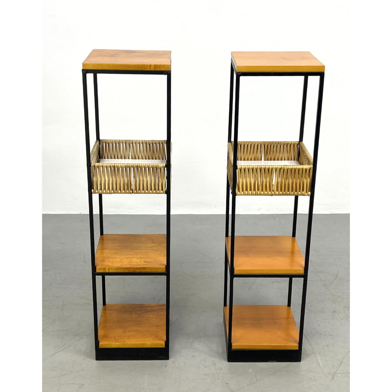 Appraisal: Pair of ARTHUR UMANOFF Shelf Stands Iron and wood Dimensions