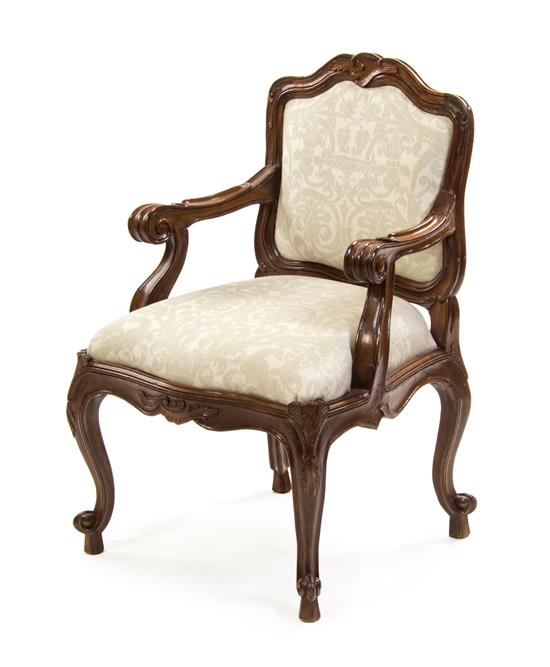 Appraisal: Sale Lot A Continental Walnut Fauteuil having a shaped floral