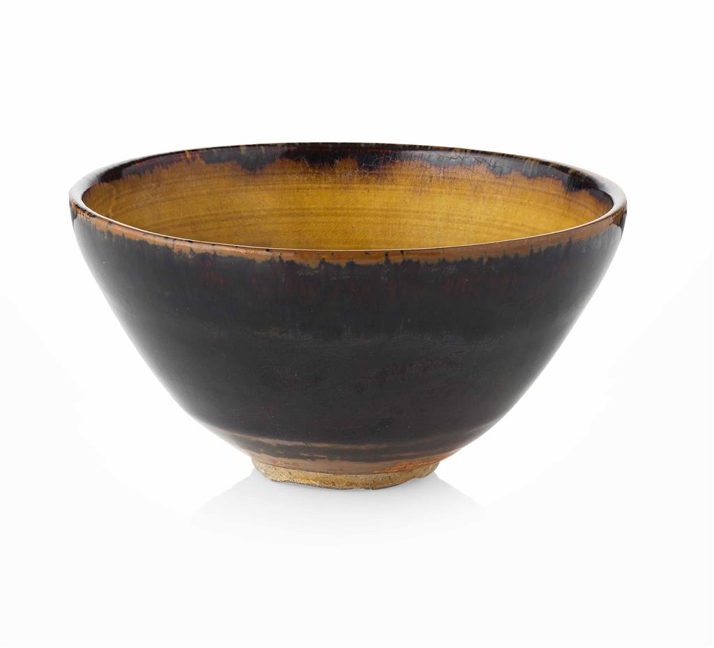 Appraisal: BLACK GLAZED BOWL SONG DYNASTY the elegantly potted cup covered