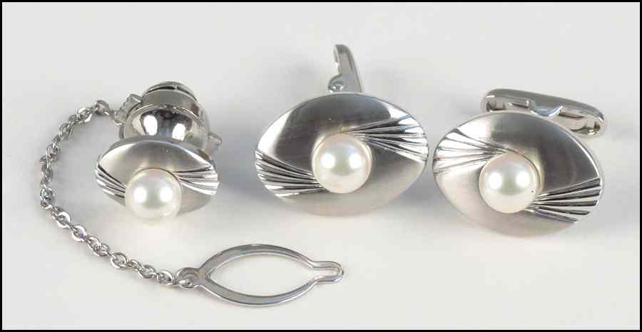 Appraisal: PEARL AND SILVER DRESS SET Comprising a pair of cufflinks