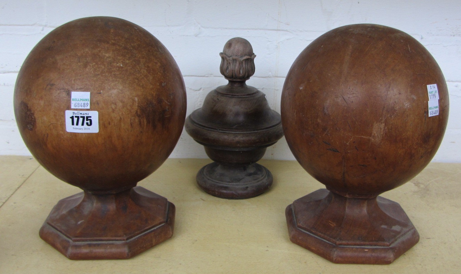 Appraisal: A pair of stained beech newell post finials of globular